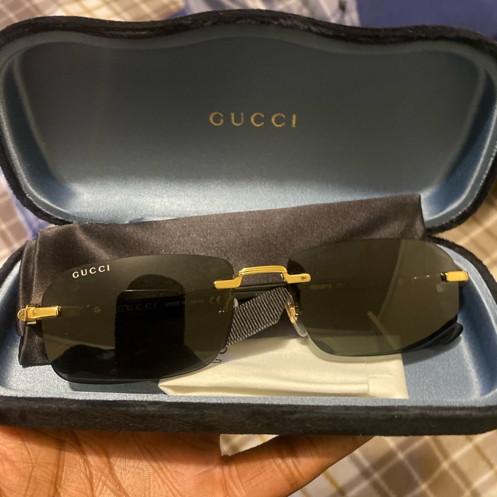Rimless Gucci glasses